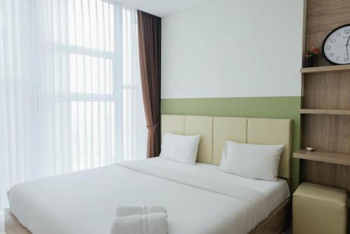 Modern Look 1BR at Brooklyn Alam Sutera Apartment By Travelio - image 4
