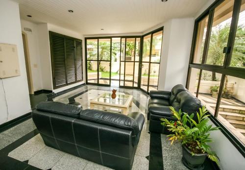 Lobby, Suites Natalia Enseada in Balneario Cidade Atlantica