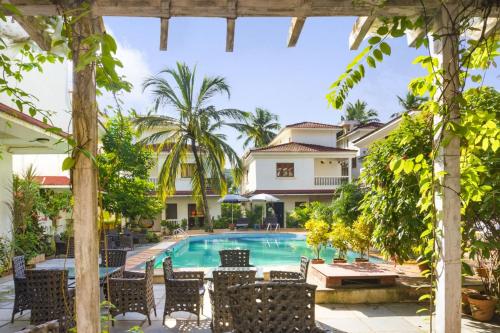 

Lavish 4-BHK pet-friendly pool villa, in proximity to Baga and Calangute Beach, by GuestHouser