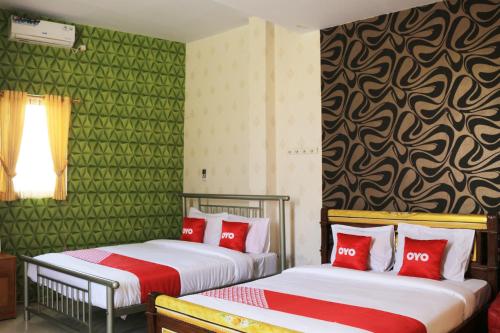 Hotel O Villa Ciparay Indah Syariah Room Type - Deluxe Family Room