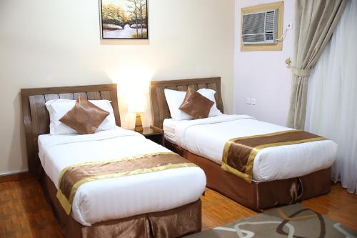 Al-Mawasem Al-Arbaa Hotel Suites
