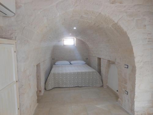 Agape fra i Trulli Dimora Orchidea chambre d'hôte Masseria Orimini