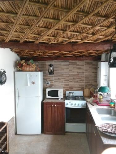 Tilcara Casa con 3 dorm y parrilla Pedacito de Cielo Cocina