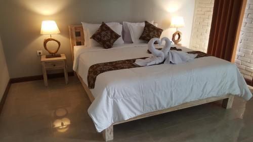 Deluxe Double Room (2 Adults + 1 Child) room in D Anyar Stay and Surf