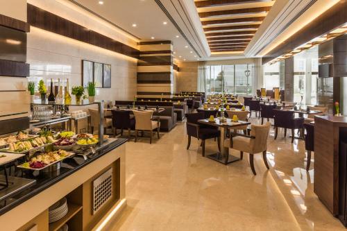 Restaurant, Golden Tulip Media Hotel in Barsha Heights (Tecom)