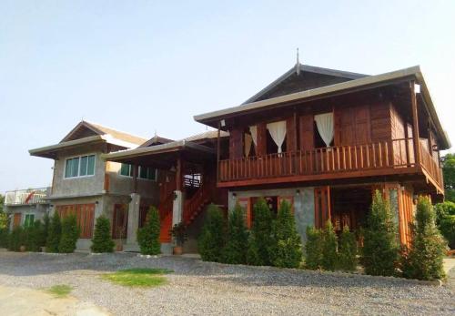 เฮือนฮอมคำโฮมสเตย์(Huanhomkham homestay) เฮือนฮอมคำโฮมสเตย์(Huanhomkham homestay)