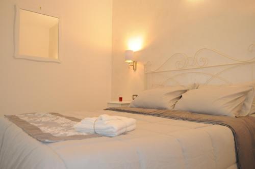 Bed, Lovely apartment gocciadimare in Alghero