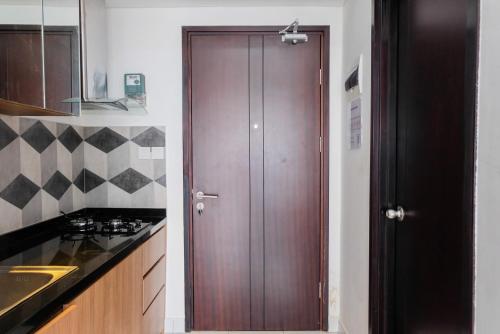Homey and Comfy Studio Casa De Parco Apartment By Travelio – Tangerang, PA