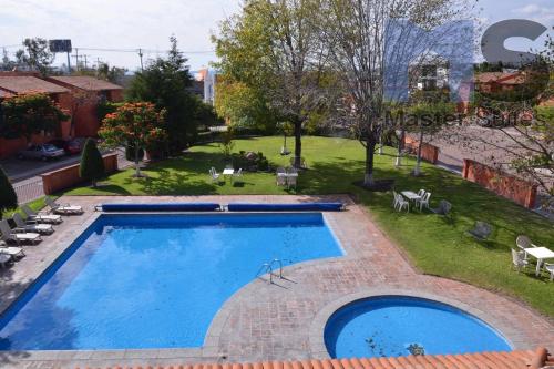 Linda y Acogedora Suite Áreas verdes Alberca Zona Norte 27B in Mendiola, Mexico