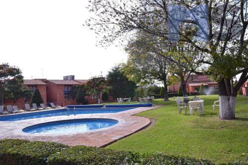 Espectacular Suite Alberca Áreas Verdes Blvd B Quintana 15D in Mendiola, Mexico