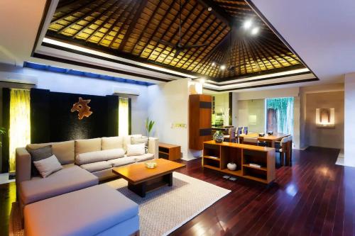 Kedonganan Beach Villas - Tap to explore photos