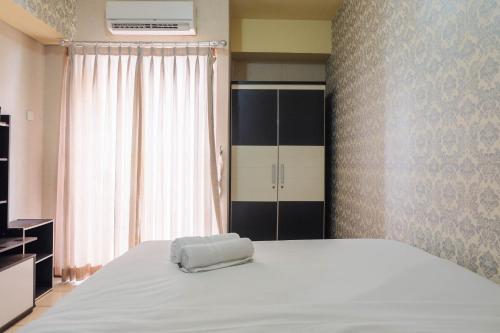Fully Furnished Studio at Serpong Greenview Apartment By Travelio