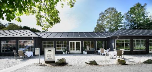 ทัศนียภาพภายนอกโรงแรม, Hotel Skovpavillonen in เคอร์เทอมินเดอ