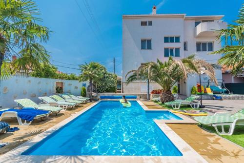 Apartments Tomo - open pool - main image