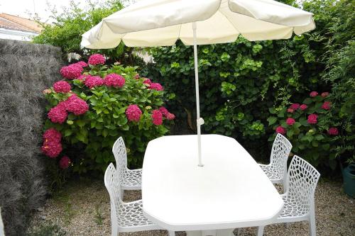 Une sympathique maison avec jardin près de l’océan - main image