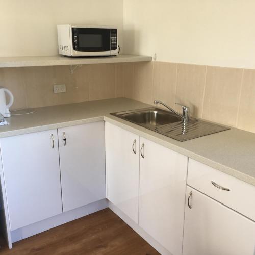 ห้องครัว, Forster and Wallis Lake Motel in ฟอสเตอร์