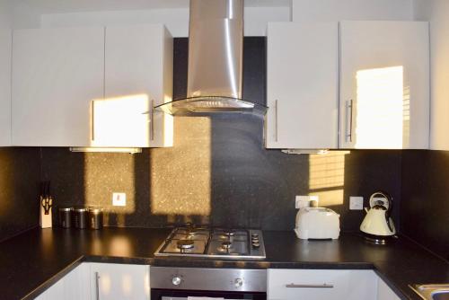 מטבח, Kelpies Serviced Apartments Hamilton- 2 Bedrooms in פלקירק
