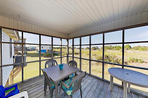 New Listing! Coastal Gem with Porch - Steps to Beach home - image 6