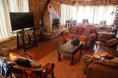 Shared lounge/TV area, Pousada Aruana in Cavalcante