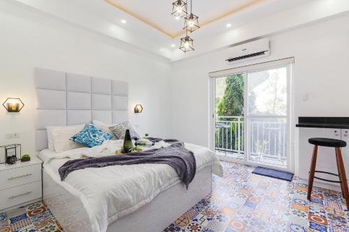 FRESIA by J&J Homes At Amani Grand Resort Residences Near Airport, Mactan