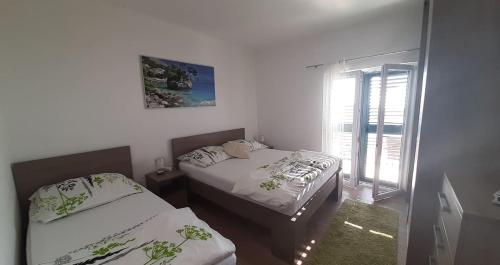 Apartments Villa Ravlić (Apartments Villa Ravlic) in Makarska