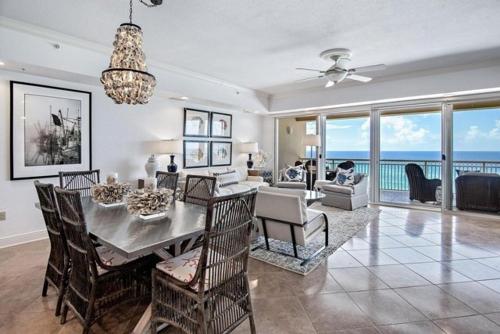 a living room with a dining room table and chairs, Dunes of Crystal Beach 404 condo in Destin (FL)