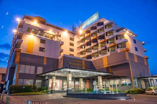 a large building with a lot of windows, Asawann Hotel (SHA Extra Plus) in Nong Khai