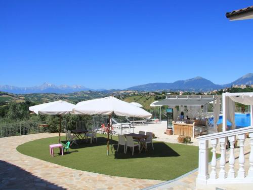  Villa with salt water and heated pool and jacuzzi near the sea in SantʼOmero