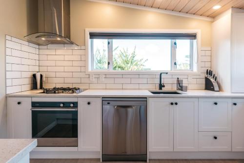 Kitchen, Pohutukawa Cottage, Waiheke Island in Waiheke Island