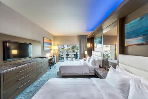 Deluxe Double Queen Room with Balcony View