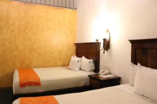 Hotel Historia - Tap to explore photos