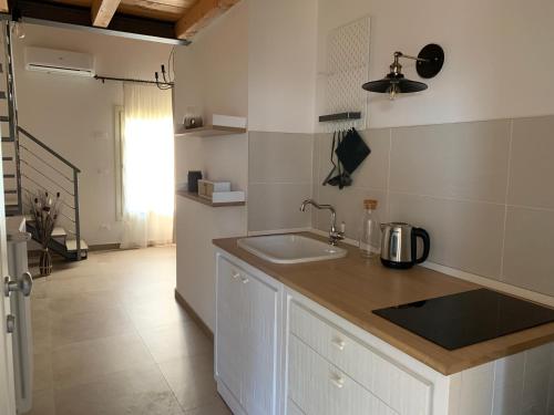 Kitchen, Antico Podere San Luca - camere con cucina in Other