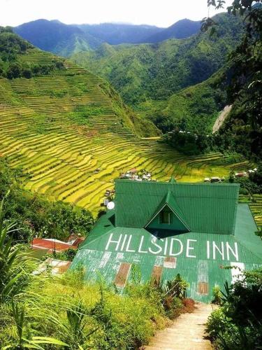 a green and white house surrounded by trees, Hillside Inn and Restaurant in Banaue