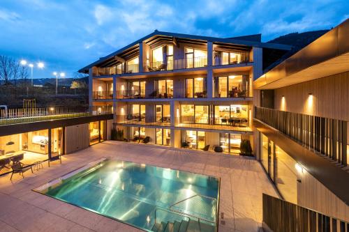 Emma Deluxe Aparthotel, Aircondition, ganzjährig beheizter Außenpool & Skibus direkt vor der Tür