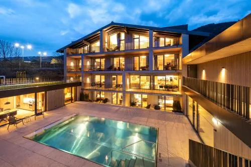 Emma Deluxe Aparthotel, Aircondition, ganzjährig beheizter Außenpool & Skibus direkt vor der Tür in Piesendorf, Österreich