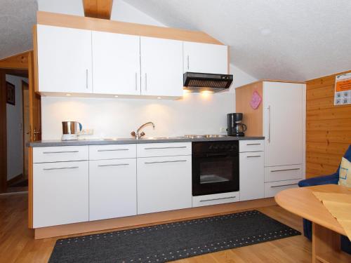 ห้องครัว, Ferienbauernhof Moosbrugger in สคอปเปอร์เนา