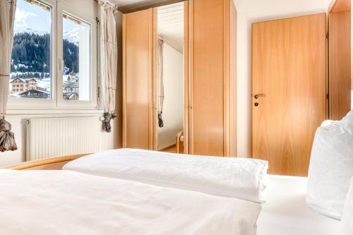 Haus Capricorn - Garten Appartement - Bergdorf Gargellen 1423m