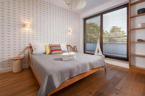 Three-Bedroom Apartment room in Apartamenty Paliki