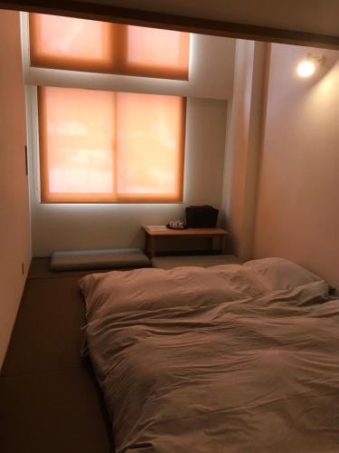 Quadruple Room with Shared Bathroom