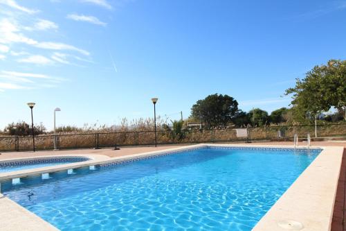 Global Properties, Apartamento en Marjal de Corinto con Piscina