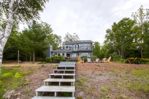 Lavish Charlevoix Home with Fire Pit on Lake Michigan - main image