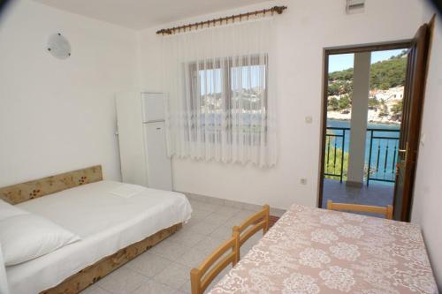 One-Bedroom Apartment with Terrace and Sea View room in Apartments by the sea Bilo Primosten - 4189