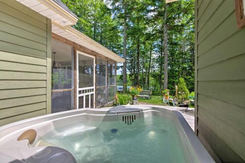 Waterfront Great Pond Cottage with Hot Tub and Deck! in Orono