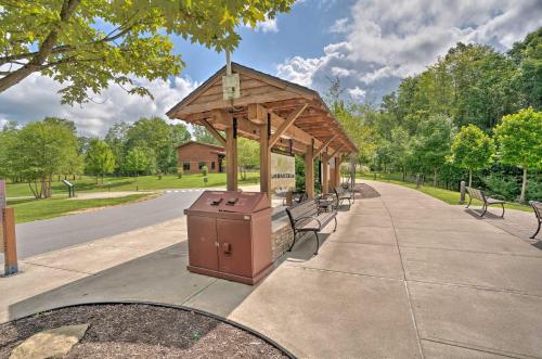 Rustic Benezette Cabin with Porch, Hot Tub and Fire Pit