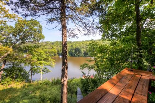 Quiet Lakefront Cottage with Dock and Resort Access!