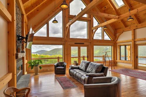 Naples Cabin with Lake Views and Wraparound Deck!