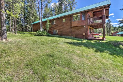 Quiet Trego Resort Cabin with Lake, Pavilion and Trails