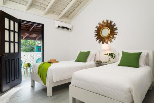 Habitación doble de 1 o 2 camas, al lado de la playa