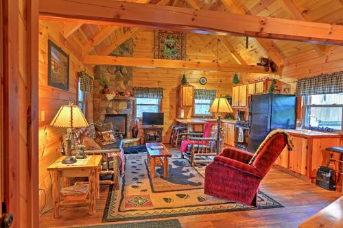 Rustic Dundee Log Cabin with Hot Tub and Forest Views!