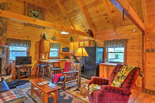 Rustic Dundee Log Cabin with Hot Tub and Forest Views!